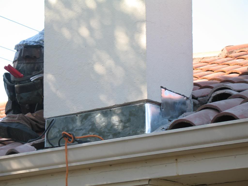 Stucco And Flashing At Base Of Chimney Need Repair Roofing/Siding